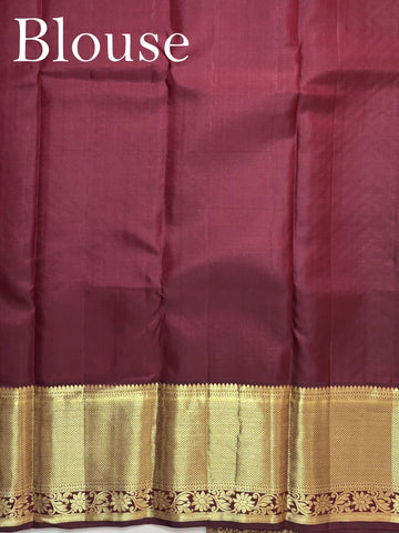 Kanchipuram Silk A masterpiece from Kanchipuram, this Kanjivaram saree in Yellow is a tribute to India's rich handloom legacy. The Pure Zari weaving and Buttis motifs make it a perfect choice for brides and celebrations. Every thread speaks of elegance, tradition, and the skilled hands that bring this saree to life. Priya - Yellow Pure Kanjivaram Silk Saree | Pure Zari - Manoranjitham Weaves - Handloom Store