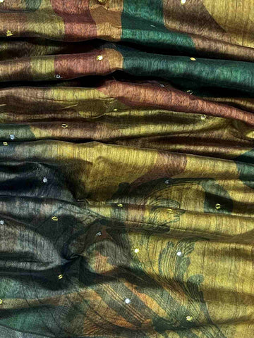 Tussars Handwoven by skilled artisans of Rajasthan, this Semi Tussar saree in Brown blends traditional elegance with intricate Semi Pure Zari zari work. A truly stunning drape for special occasions. The interplay of colors and craftsmanship makes it a treasured piece for every saree connoisseur. Rageshree - Art Silk saree - Manoranjitham Weaves - Handloom Store
