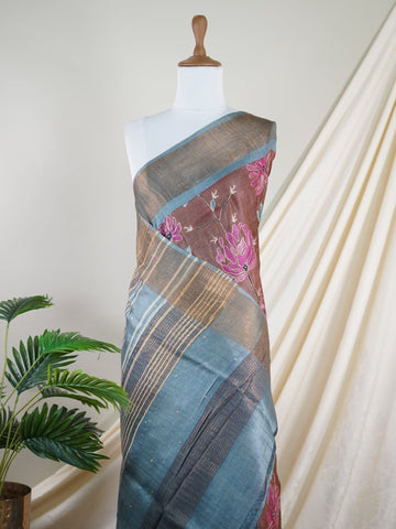 Tussars A Tussar saree with digital print and intricate Aari Peeta work, combining contemporary style with delicate handcraft. Rageshreea - Tussar Silk Saree | Digital Print - Manoranjitham Weaves - Handloom Store