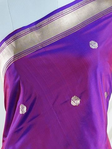 Katan An exquisite creation from Varanasi, this glass tissue saree is adorned with delicate embroidery and refined ari pita work. Its sheer texture catches the light with every fold, while the intricate detailing adds depth and artistry. A luminous drape for occasions steeped in grace and tradition. Ranjitha - Manoranjitham Weaves - Handloom Store