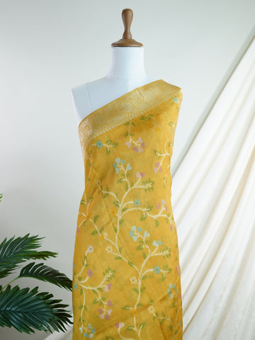 Georgette This Tussar Georgette saree from Varanasi brings together the textured richness of tussar silk with the fluid grace of georgette. Woven on a powerloom, it drapes light and airy, perfect for effortless elegance. Ideal for both day events and evening gatherings, it reflects quiet sophistication with a modern twist on tradition. Rohini - Georgette Saree | Handwoven | Varanasi - Manoranjitham Weaves - Handloom Store