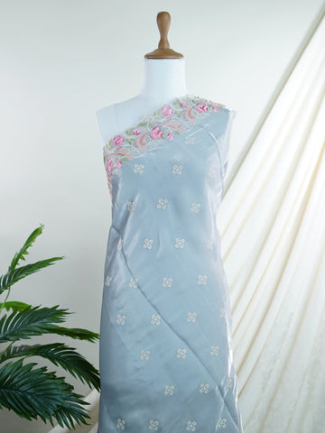 Tissue Woven in Varanasi, this ethereal grey glass tissue saree shimmers with a multi-hued embroidered flourish. Light as air yet rich in detail, it blends sheer elegance with vibrant artistry. A perfect pick for soirées that call for subtle glamour and intricate craftsmanship. #GlassTissueSaree #EmbroideredElegance #VaranasiWeaves #GreyAndGraceful #SheerHeritage






 Sakshi - Manoranjitham Weaves - Handloom Store