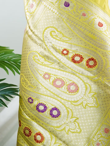 Katan An exquisite creation from Varanasi, this glass tissue saree is adorned with delicate embroidery and refined ari pita work. Its sheer texture catches the light with every fold, while the intricate detailing adds depth and artistry. A luminous drape for occasions steeped in grace and tradition. Sharadamba - Manoranjitham Weaves - Handloom Store