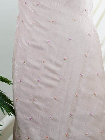 Katan Woven in Varanasi, this ethereal grey glass tissue saree shimmers with a multi-hued embroidered flourish. Light as air yet rich in detail, it blends sheer elegance with vibrant artistry. A perfect pick for soirées that call for subtle glamour and intricate craftsmanship. #GlassTissueSaree #EmbroideredElegance #VaranasiWeaves #GreyAndGraceful #SheerHeritage






 Shruthi - Manoranjitham Weaves - Handloom Store