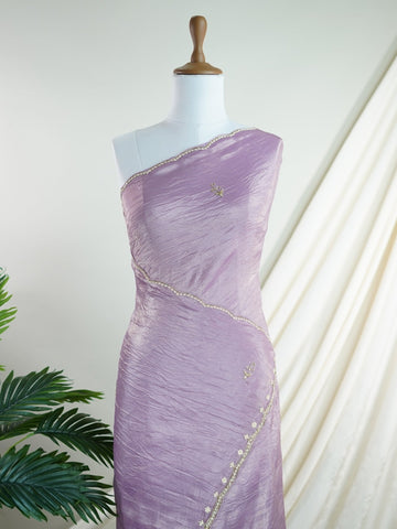 Organza A masterpiece from Karnataka, this 100% Pure Organza saree in Mauve is a tribute to India's rich handloom legacy. The nan weaving and Handwork motifs make it a perfect choice for brides and celebrations. Every thread speaks of elegance, tradition, and the skilled hands that bring this saree to life. Sohinia - Organza Saree | Embroidered - Manoranjitham Weaves - Handloom Store