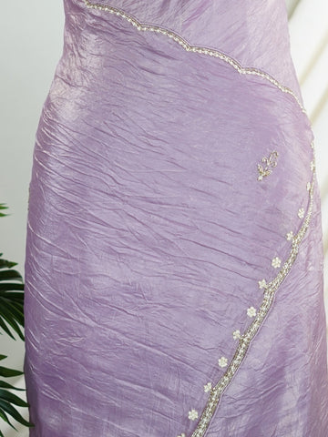 Organza A masterpiece from Karnataka, this 100% Pure Organza saree in Mauve is a tribute to India's rich handloom legacy. The nan weaving and Handwork motifs make it a perfect choice for brides and celebrations. Every thread speaks of elegance, tradition, and the skilled hands that bring this saree to life. Sohinia - Organza Saree | Embroidered - Manoranjitham Weaves - Handloom Store