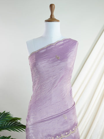 Organza A masterpiece from Karnataka, this 100% Pure Organza saree in Mauve is a tribute to India's rich handloom legacy. The nan weaving and Handwork motifs make it a perfect choice for brides and celebrations. Every thread speaks of elegance, tradition, and the skilled hands that bring this saree to life. Sohinia - Organza Saree | Embroidered - Manoranjitham Weaves - Handloom Store