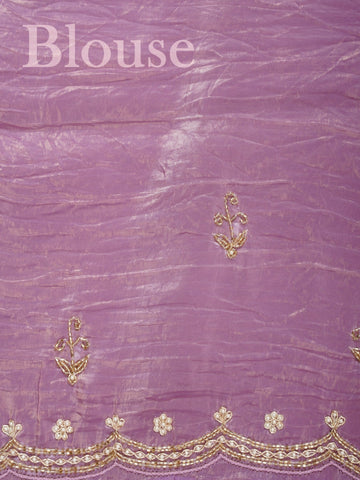 Organza A masterpiece from Karnataka, this 100% Pure Organza saree in Mauve is a tribute to India's rich handloom legacy. The nan weaving and Handwork motifs make it a perfect choice for brides and celebrations. Every thread speaks of elegance, tradition, and the skilled hands that bring this saree to life. Sohinia - Organza Saree | Embroidered - Manoranjitham Weaves - Handloom Store