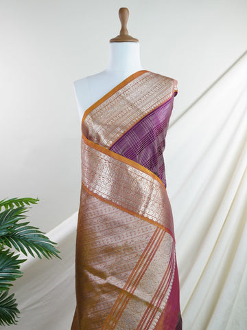 Venkatagiri Silk Woven in the heart of Andhra Pradesh, this Venkatagiri handloom saree is a symbol of regal elegance and heritage. Known for its soft texture and intricate craftsmanship, it drapes gracefully for weddings, pujas, and festive moments. Each thread carries tradition, making it a cherished piece of South Indian artistry. Lightweight yet luxurious — a true sree in every sense. Tavisha - Manoranjitham Weaves - Handloom Store