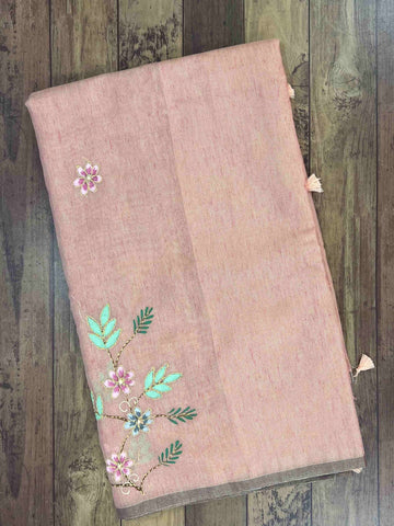 tissue This 100% Pure Cotton silk saree, adorned in Pink  and detailed with Semi Pure Zari weaving, reflects the grandeur of Rajasthan. The timeless Handprint motifs enhance its bridal charm. A perfect blend of luxury and tradition, it is designed for those who appreciate fine craftsmanship. Suruti - Cottons & Linens saree - Manoranjitham Weaves - Handloom Store