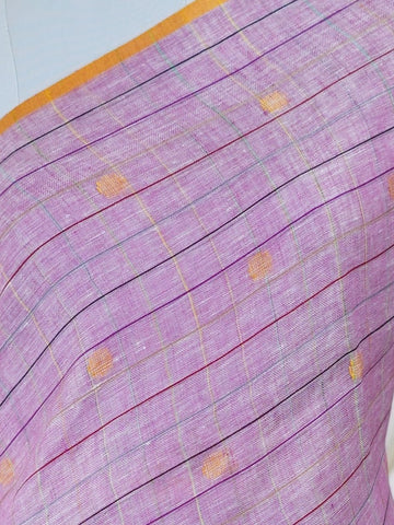 Linen A masterpiece from Gujarat, this Linen saree in Light Pink is a tribute to India's rich handloom legacy. The nan weaving and Handwork motifs make it a perfect choice for brides and celebrations. Every thread speaks of elegance, tradition, and the skilled hands that bring this saree to life. Tilak Kamoda - Light Pink Handloom Cotton Saree | Zari Border | Traditional - Manoranjitham Weaves - Handloom Store