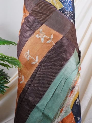 Tussars A Tussar saree with digital print and intricate Aari Peeta work, combining contemporary style with delicate handcraft. Tilak Kamoda     - Manoranjitham Weaves - Handloom Store