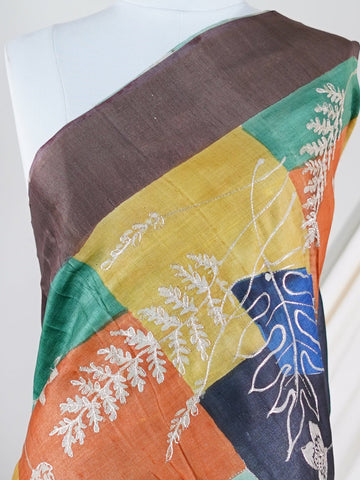 Tussars A Tussar saree with digital print and intricate Aari Peeta work, combining contemporary style with delicate handcraft. Tilak Kamoda     - Manoranjitham Weaves - Handloom Store