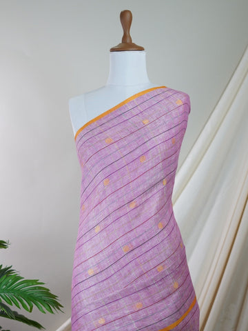 Linen A masterpiece from Gujarat, this Linen saree in Light Pink is a tribute to India's rich handloom legacy. The nan weaving and Handwork motifs make it a perfect choice for brides and celebrations. Every thread speaks of elegance, tradition, and the skilled hands that bring this saree to life. Tilak Kamoda - Light Pink Handloom Cotton Saree | Zari Border | Traditional - Manoranjitham Weaves - Handloom Store