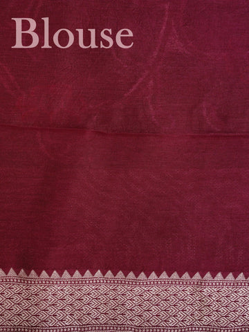 Georgette This Tussar Georgette saree from Varanasi brings together the textured richness of tussar silk with the fluid grace of georgette. Woven on a powerloom, it drapes light and airy, perfect for effortless elegance. Ideal for both day events and evening gatherings, it reflects quiet sophistication with a modern twist on tradition. Rajalakshmi - Georgette Saree | Handwoven | Varanasi - Manoranjitham Weaves - Handloom Store