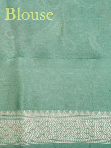 Georgette This Tussar Georgette saree from Varanasi brings together the textured richness of tussar silk with the fluid grace of georgette. Woven on a powerloom, it drapes light and airy, perfect for effortless elegance. Ideal for both day events and evening gatherings, it reflects quiet sophistication with a modern twist on tradition. Manjari - Georgette Saree | Handwoven | Varanasi - Manoranjitham Weaves - Handloom Store
