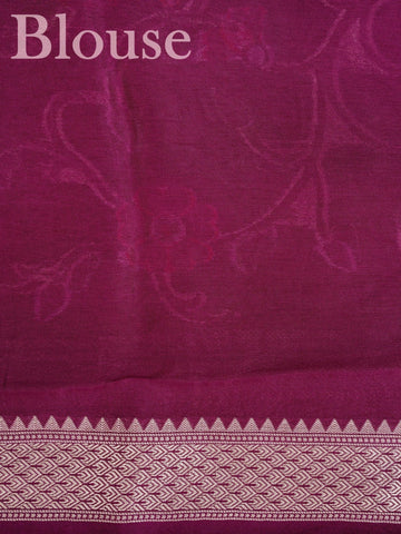 Georgette This Tussar Georgette saree from Varanasi brings together the textured richness of tussar silk with the fluid grace of georgette. Woven on a powerloom, it drapes light and airy, perfect for effortless elegance. Ideal for both day events and evening gatherings, it reflects quiet sophistication with a modern twist on tradition. Mallika - Georgette Saree | Handwoven | Varanasi - Manoranjitham Weaves - Handloom Store