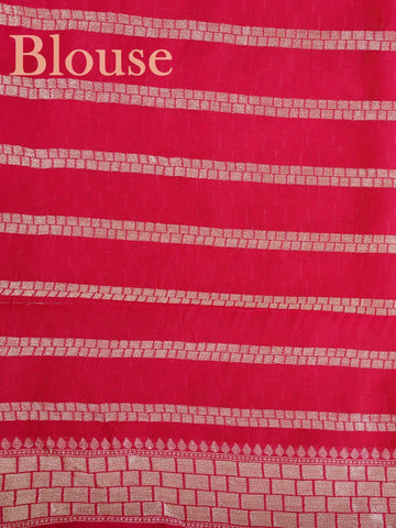 Georgette This Tussar Georgette saree from Varanasi brings together the textured richness of tussar silk with the fluid grace of georgette. Woven on a powerloom, it drapes light and airy, perfect for effortless elegance. Ideal for both day events and evening gatherings, it reflects quiet sophistication with a modern twist on tradition. Yashodhara - Georgette Saree | Handwoven | Varanasi - Manoranjitham Weaves - Handloom Store