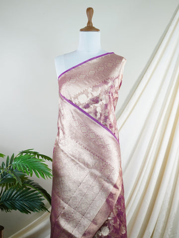 Katan A Tissue saree is the perfect blend of delicate silk and shimmering zari, woven to create an ethereal, translucent fabric that sparkles with every movement. Lightweight and luxurious, it’s ideal for grand occasions and celebrations where elegance is key. Draped in a Tissue saree, you embody timeless glamour with a modern twist. Vasundhara - Manoranjitham Weaves - Handloom Store
