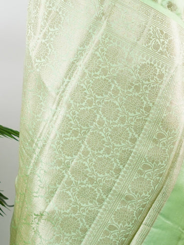 Chiniya Silk A masterpiece in 100% Pure Silk , this Peach saree adorned with Gold and Silver Zari Buttas patterns exudes regal charm. Perfect for the modern bride who cherishes tradition. Himadri - Manoranjitham Weaves - Handloom Store