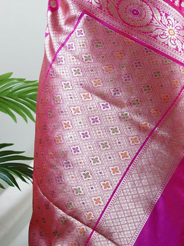 Katan An exquisite creation from Varanasi, this glass tissue saree is adorned with delicate embroidery and refined ari pita work. Its sheer texture catches the light with every fold, while the intricate detailing adds depth and artistry. A luminous drape for occasions steeped in grace and tradition. Yashomathi - Manoranjitham Weaves - Handloom Store